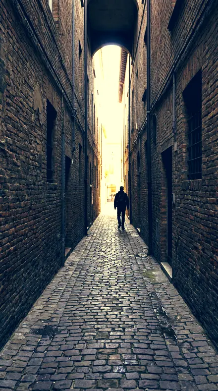 Graded with Warm Cool Split: The alley, lit warm, shaded cool